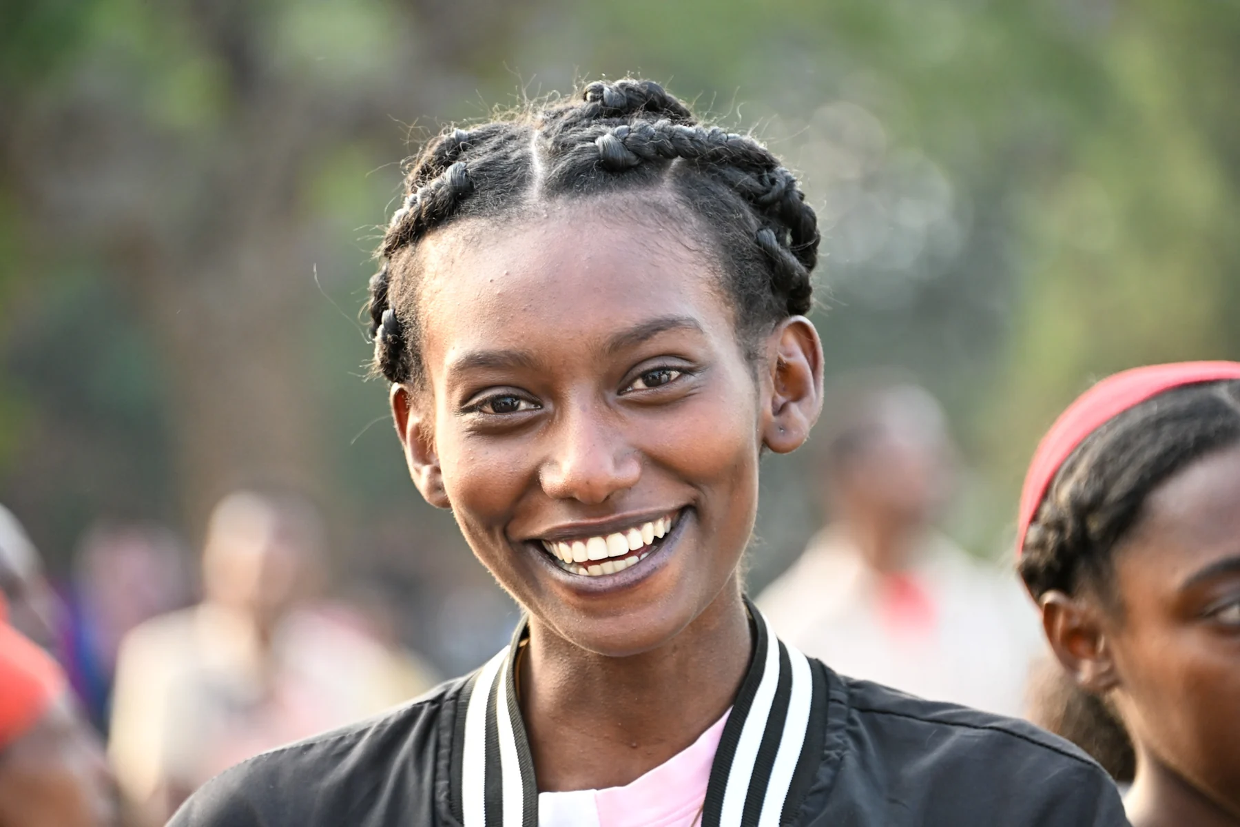 A smiling young woman