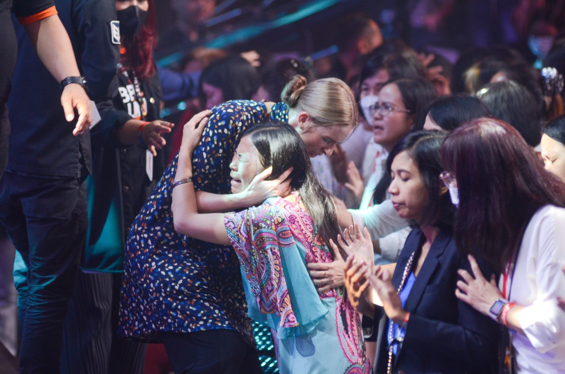 Believers receiving ministry during a soul-winning weekend